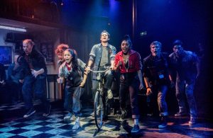 Liam-Tamne-centre-in-WORKING-credit-Robert-Workman1-700x455